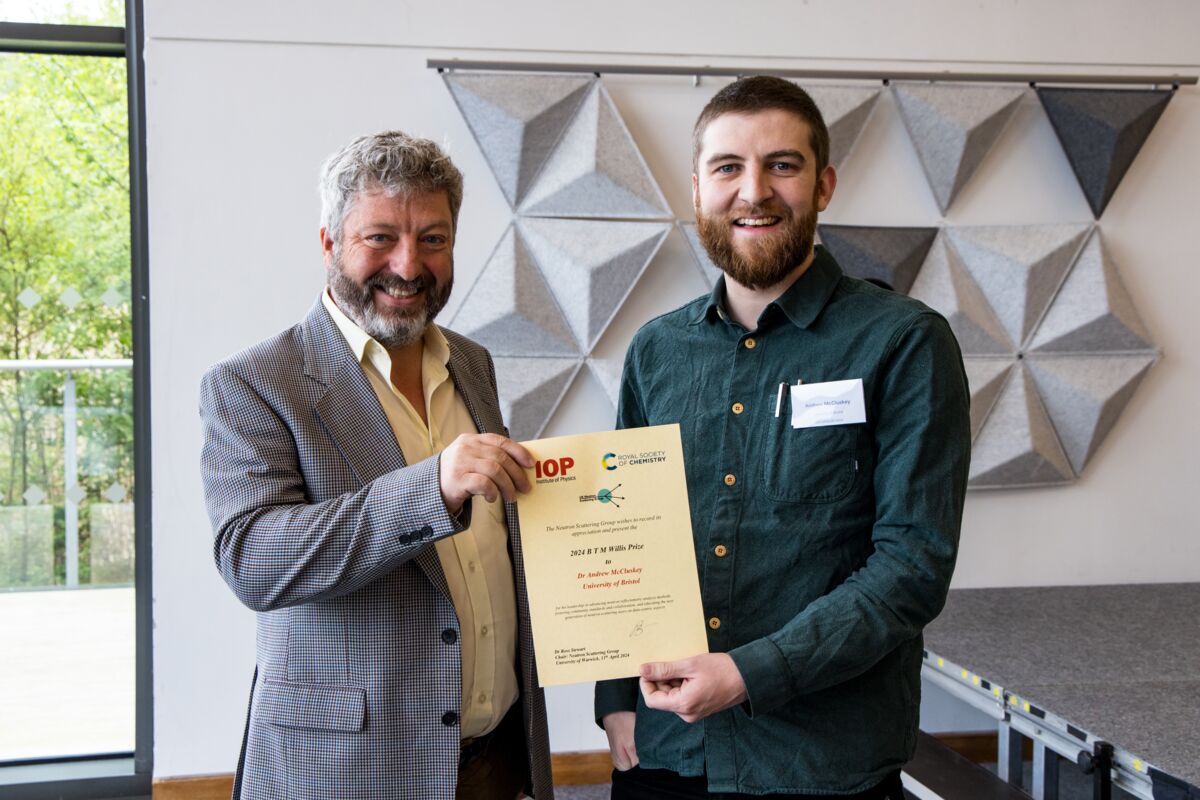 Andrew receiving the B.T.M. Willis Prize from Ross Stewart